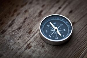 Compass that represents Francis Investment Counsel's collaborative and purposeful work ethic